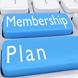 membership plan appearing on keys of keyboard   