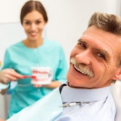 elderly man at his dental checkup