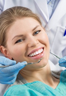 woman smiling during dental checkup